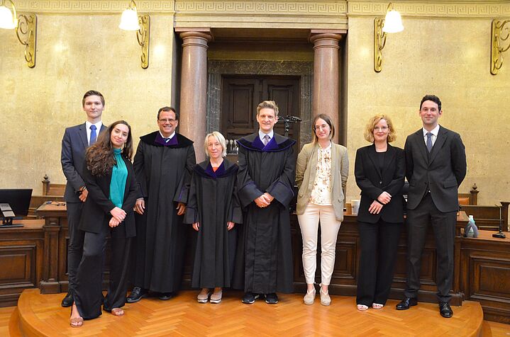 group picture with the judges and finalists of the moot court