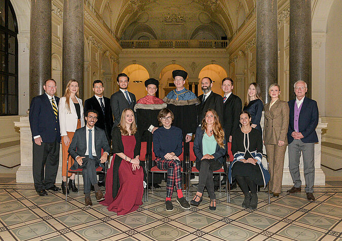 group picture with graduates at Great Ceremonial Hall of the University of Vienna